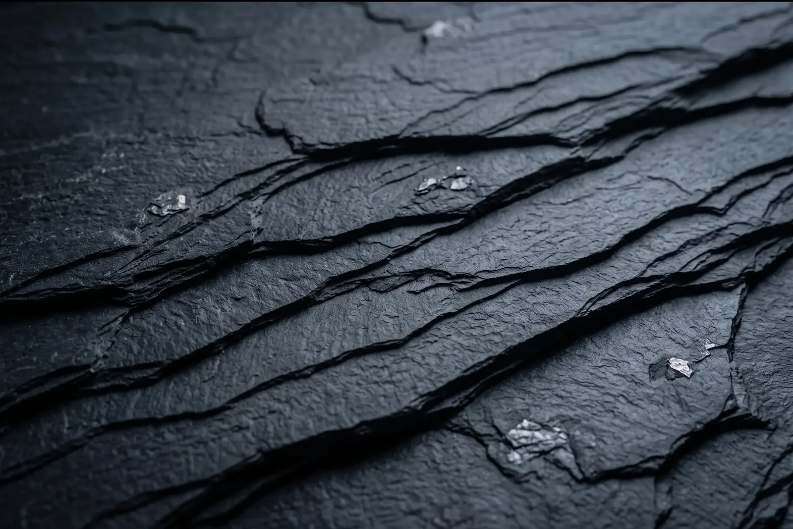 Macro of blue-black slate showing its natural lamination